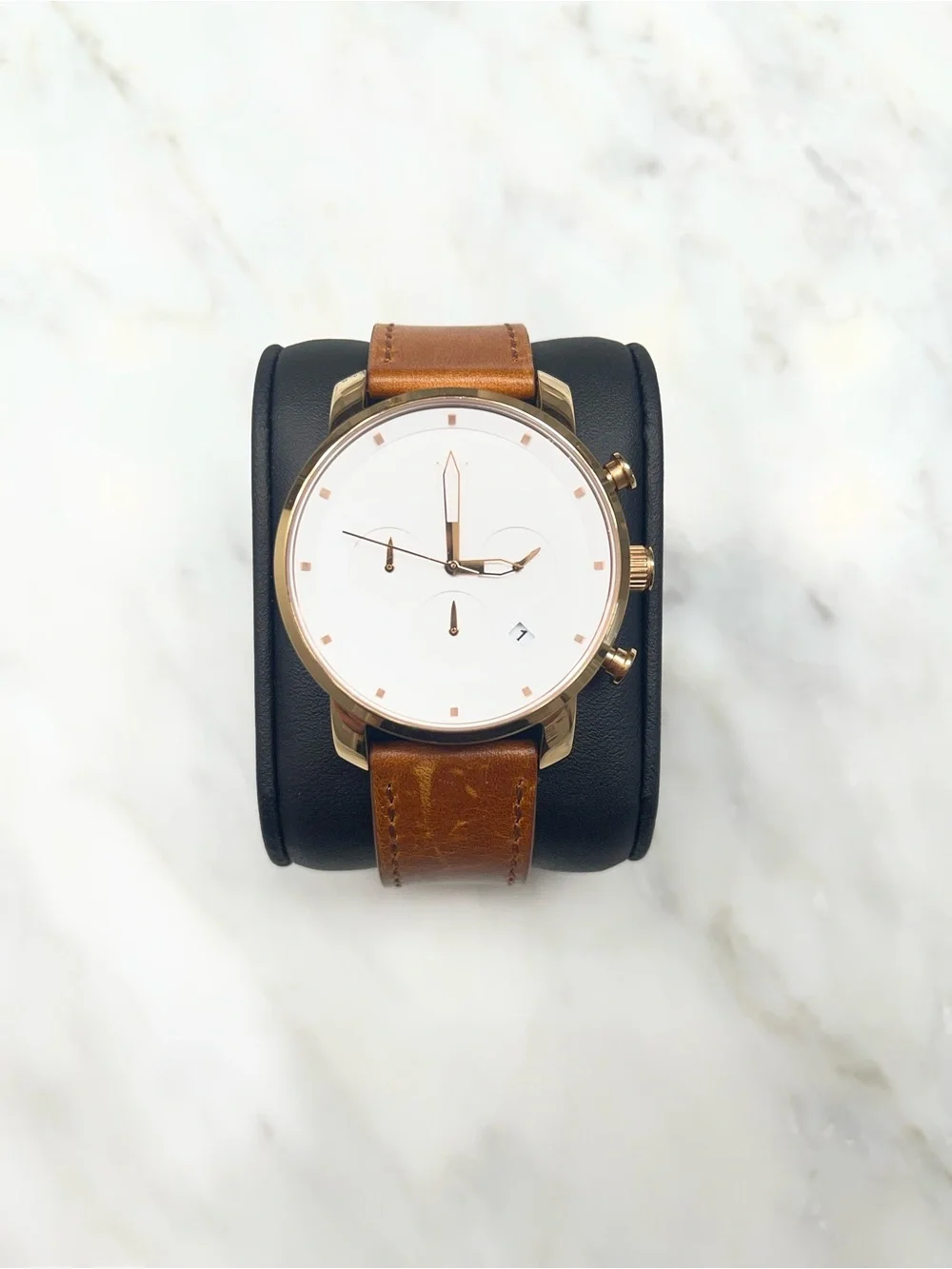Men’s MVMT chronograph style watch with white dial and brown leather strap